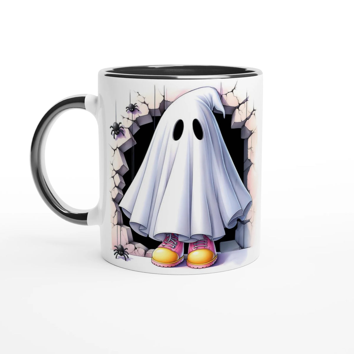 White mug with black handle and interior, featuring a sheet ghost in pink and yellow shoes, framed by cracked stone and spiders.