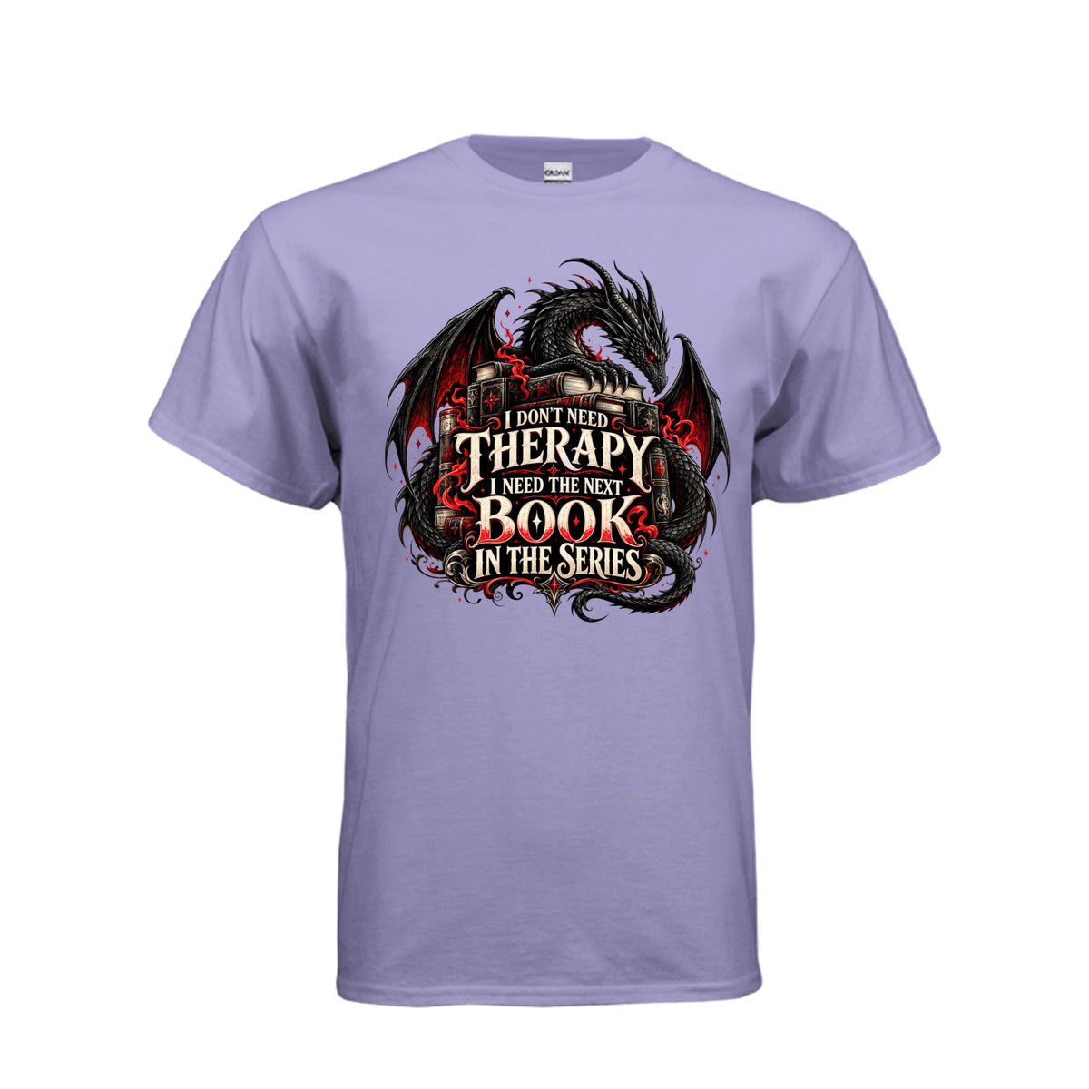 Front view of violet T-shirt featuring a black and red dragon, stacked books, and the quote “I don’t need therapy, I need the next book in the series.”